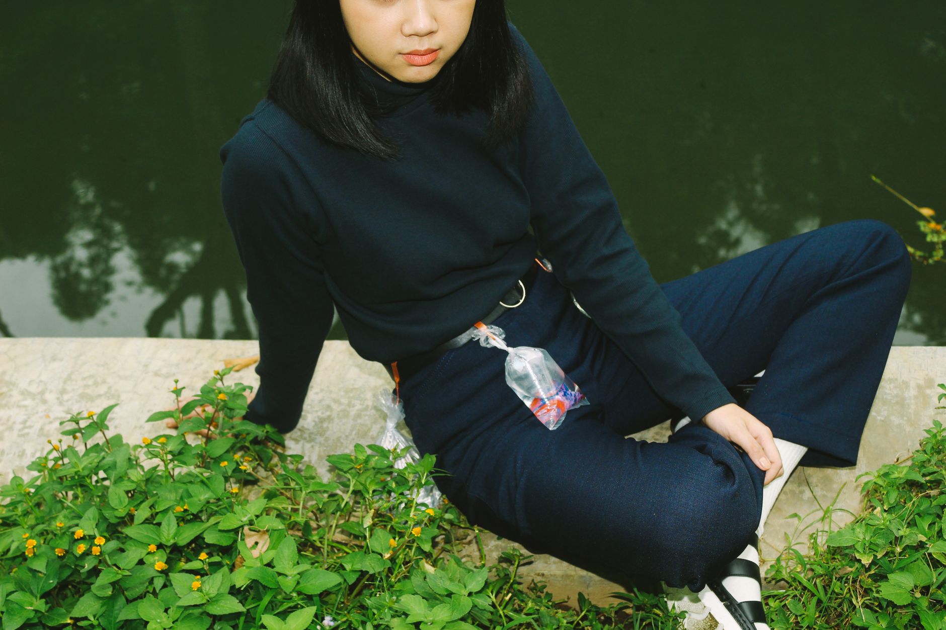 Navy tailored ankle pants styled for travel