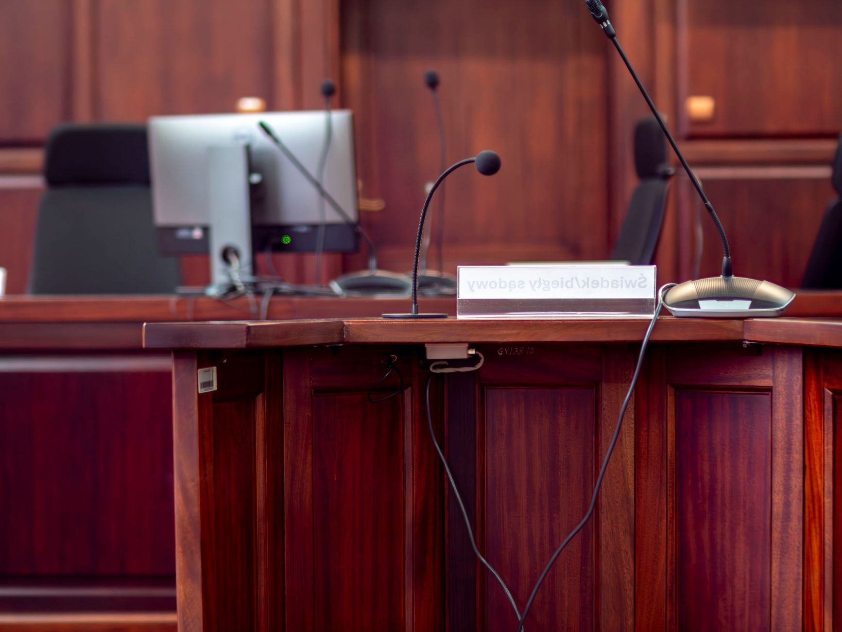 Empty courtroom interior illustrating formal dress code settings