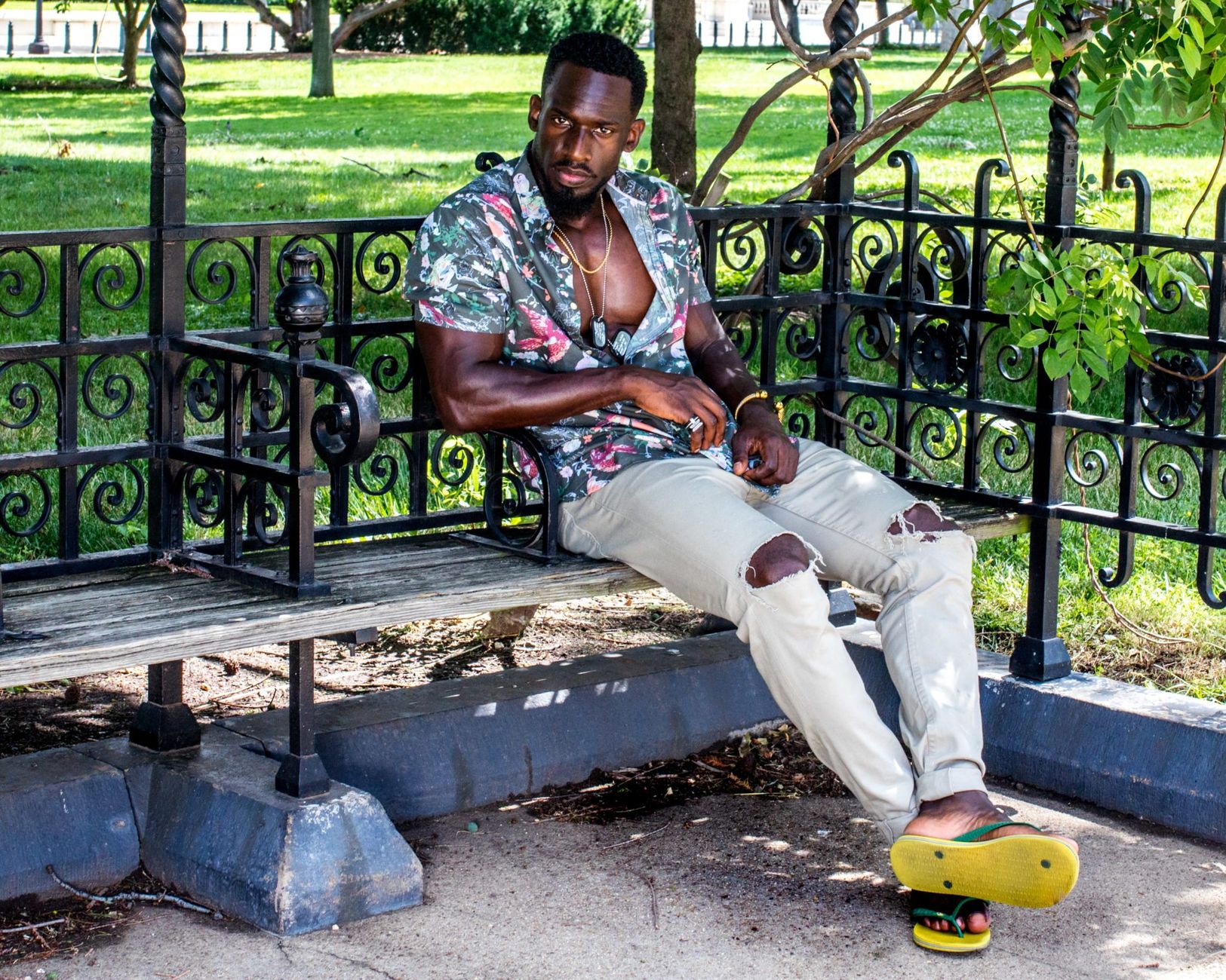 Flip flops, graphic t-shirt and ripped jeans shown as unacceptable business casual items