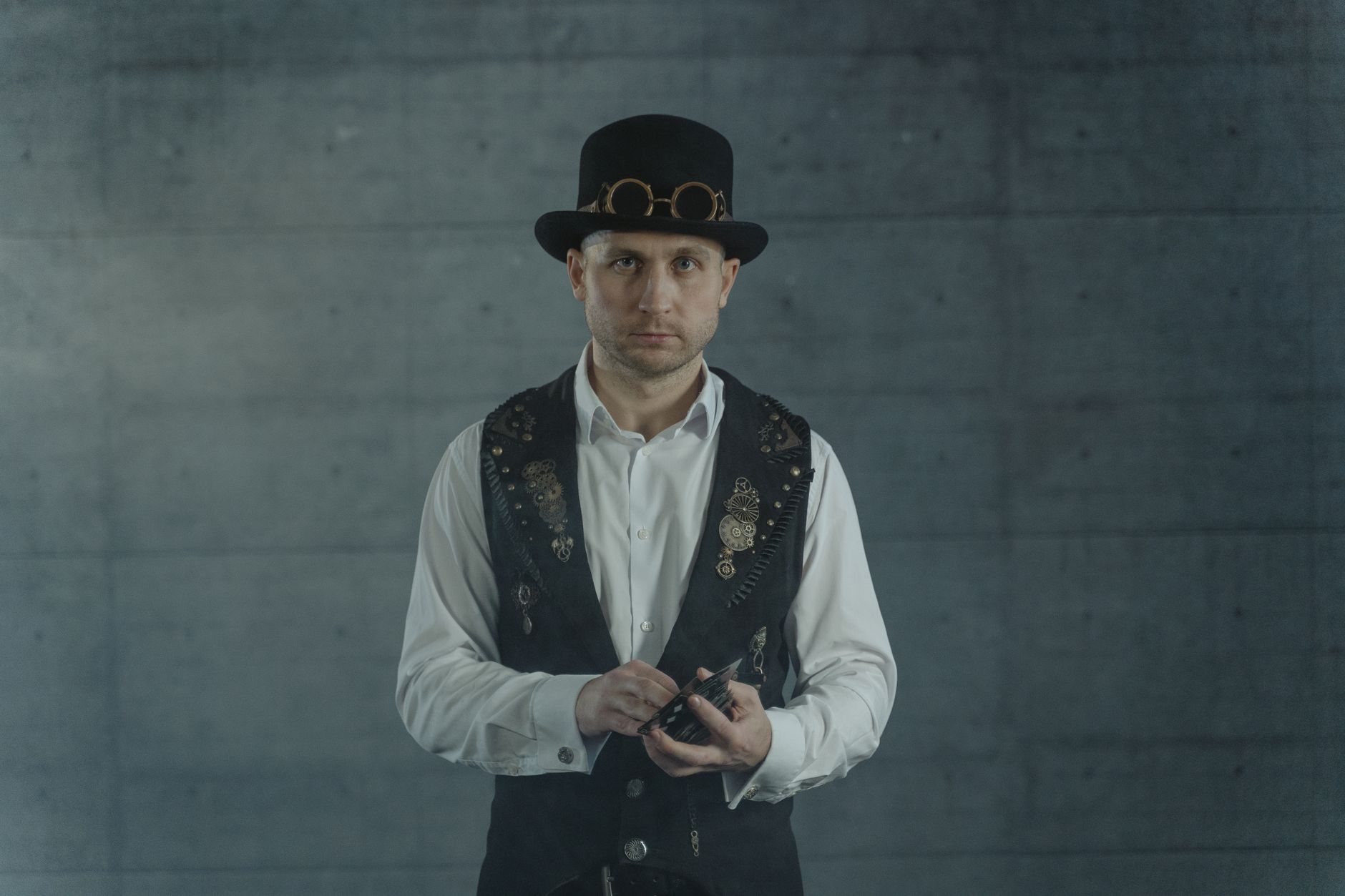 White shirt with waistcoat and X-back suspenders in speakeasy style
