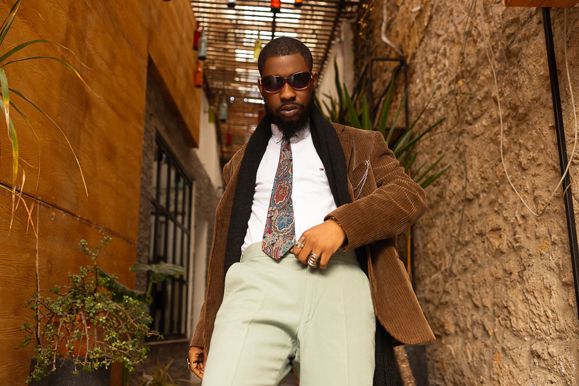 1970s vintage mens style corduroy flares with camp collar shirt and leather braces