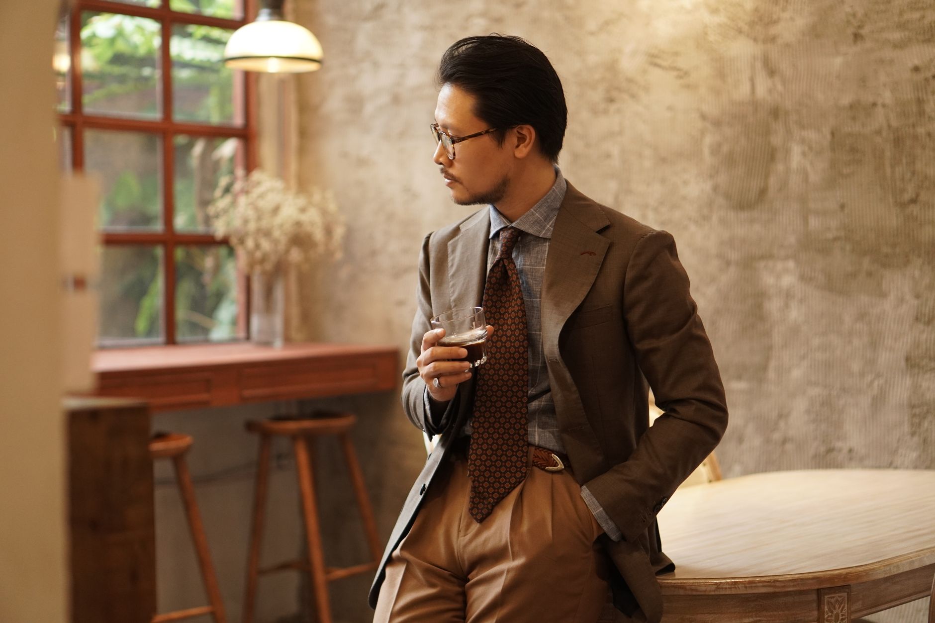 Oxford button-down shirt with knit tie, flannel trousers and slim braces