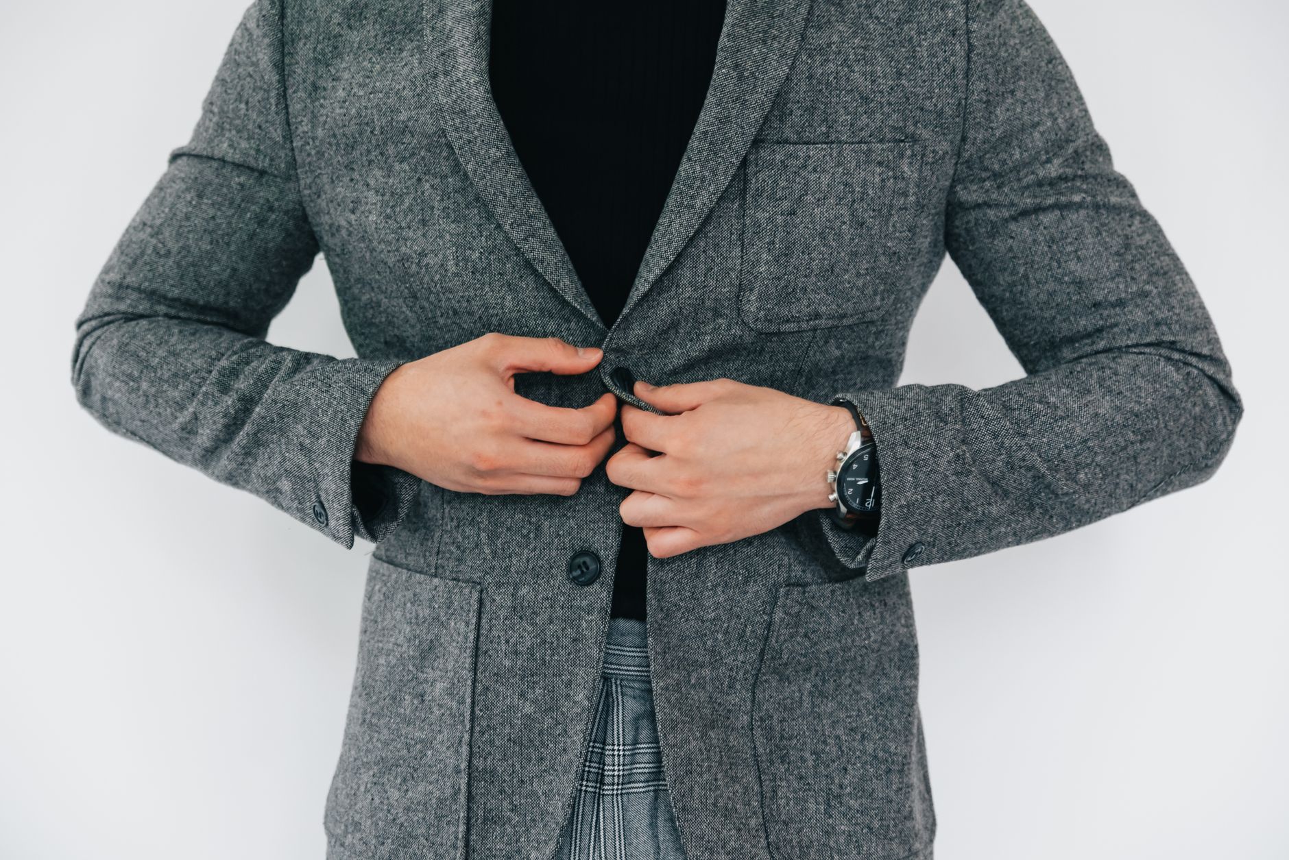 Monochrome charcoal knit and trousers with black loafers